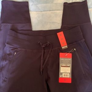 Kirkland navy active pants, size M.